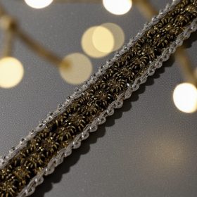 Fekete arany paszomány ezüst széllel